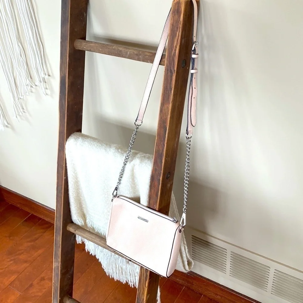 Rebecca Minkoff crossbody bag in a pale pink. Great summer bag! Zipper detail!